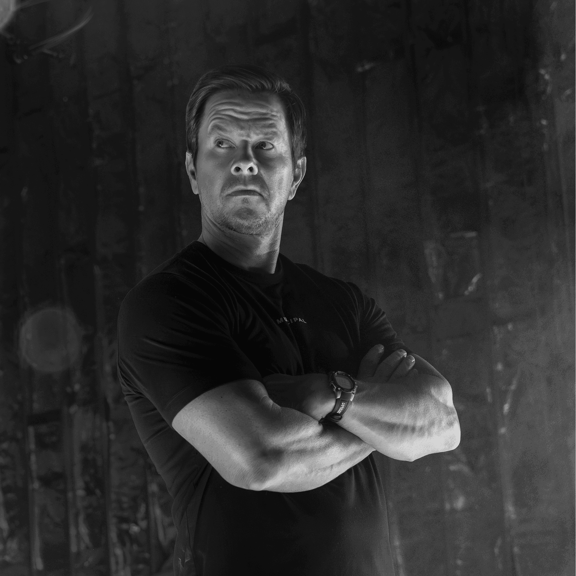 Municipal Gym founder Mark Wahlberg standing with his arms crossed
